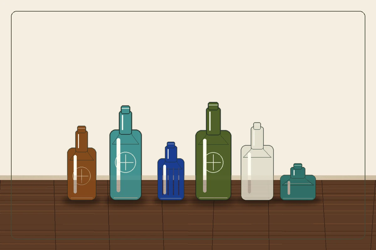 Curated shelf of antique bottles in several colors and forms